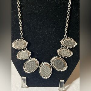 Elegant Silver Necklace with Textured Ovals
